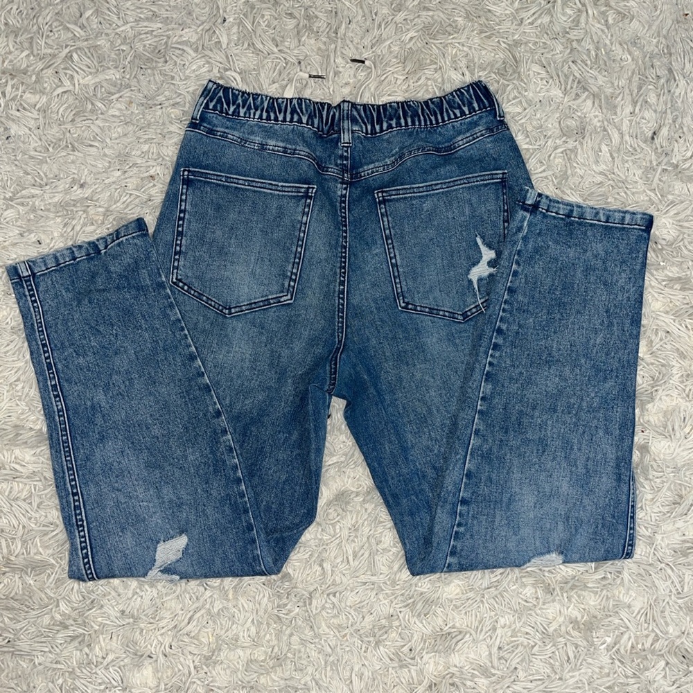 Baggy stretchy waist ripped jeans/pants size M.